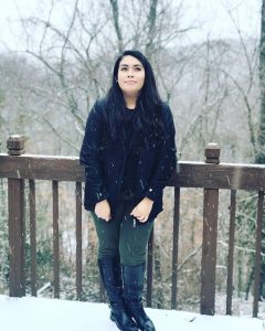 Jackie Lozano standing outside in snow.