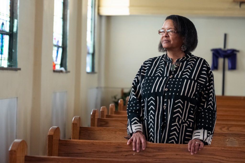 Dr. Norma Thomas inside John Wesley AME Zion Church in Uniontown, Pennsylvania. The church is an important historical landmark as it was once a safe house for slaves traveling north on the Underground Railroad. Photo: Justin Hayhurst/100 Days in Appalachia