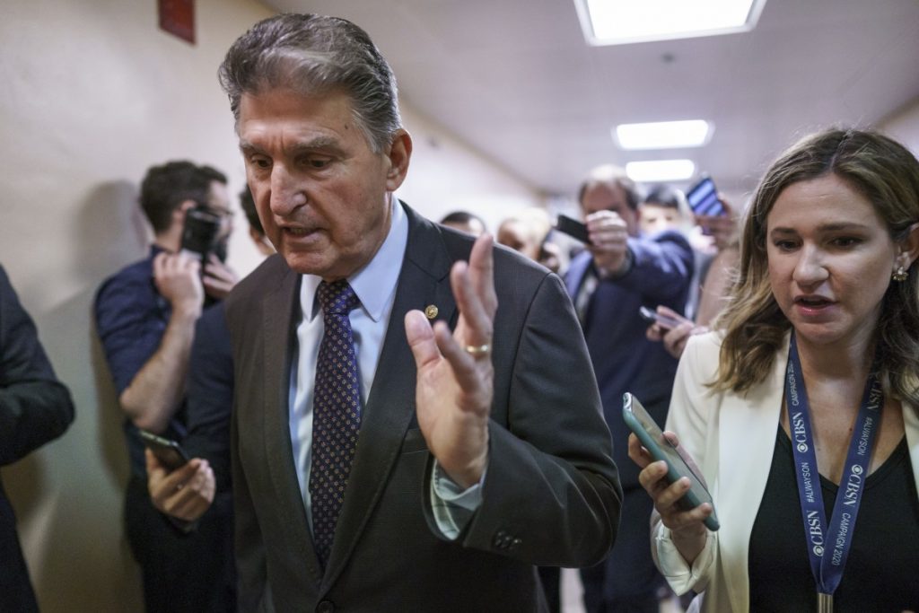 Sen. Joe Manchin, D-W.Va., a crucial 50th vote for Democrats on President Joe Biden's proposals, walks with reporters as senators go to the chamber for votes ahead of the approaching Memorial Day recess, at the Capitol in Washington, Thursday, May 27, 2021. Senate Republicans are ready to deploy the filibuster to block a commission on the Jan. 6 insurrection, shattering chances for a bipartisan probe of the deadly assault on the U.S. Capitol and reviving pressure to do away with the procedural tactic that critics say has lost its purpose. Photo: J. Scott Applewhite/AP Photo