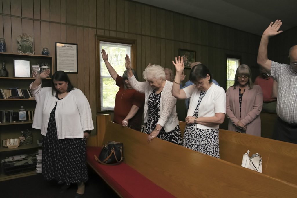 Sunday morning worship at the Sweet Home Old Regular Baptist Church in Coeburn, Virginia. Baptist Churches are declining in numbers, but can still be found along the border of Kentucky and Virginia. Photo: Stacy Kranitz/100 Days in Appalachia
