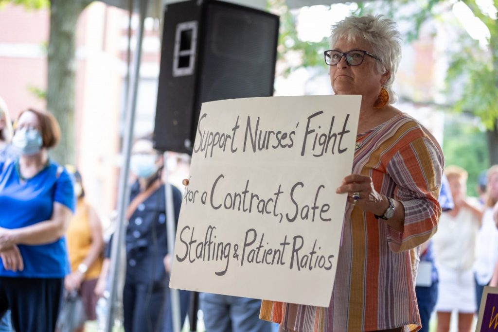 Lorraine Starsky holds a sign during a rally to support unionization efforts outside West Penn hospital on August 3, 2021. Photo: David Smith/100 Days in Appalachia