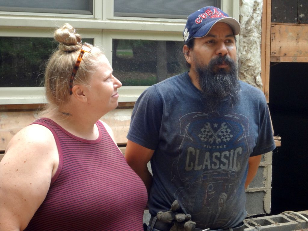 Crystal and Victor Mancia, relatively new arrivals from Wisconsin, lost their "home of hospitality" in the flooding. Photo: Taylor Sisk/100 Days in Appalachia